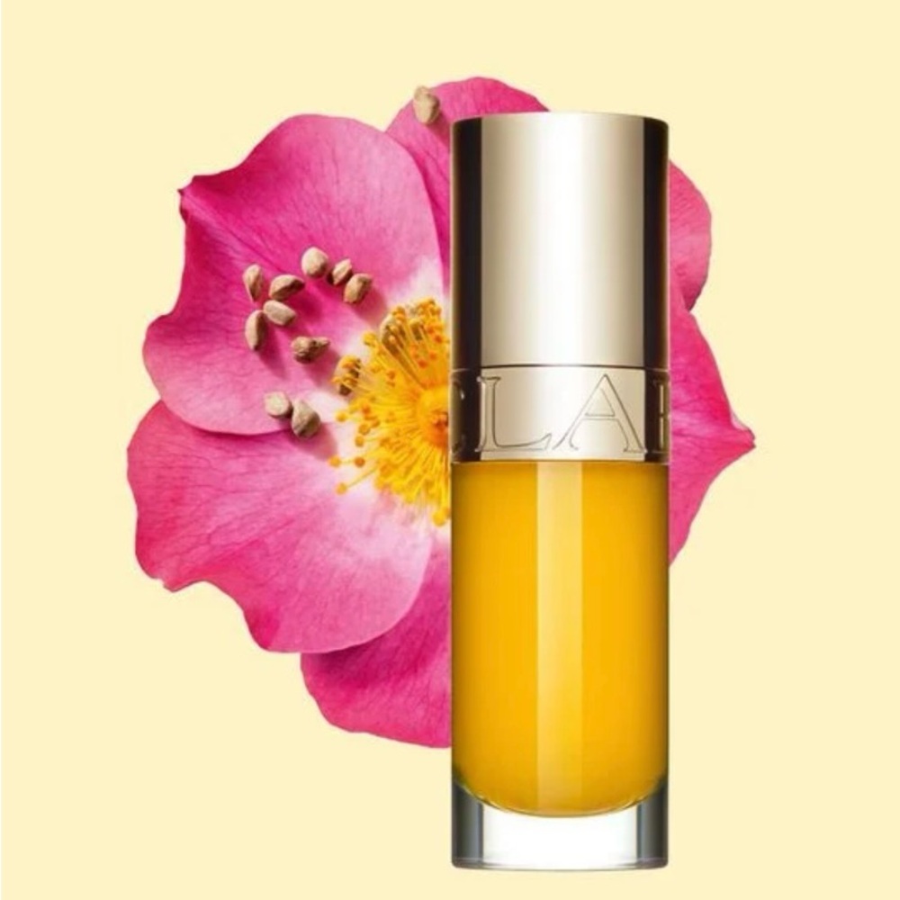 NWOB CLARINS PARIS LIP OIL COLOR HONEY GLAM. PRICE IS FIRM NO DISCOUNTS